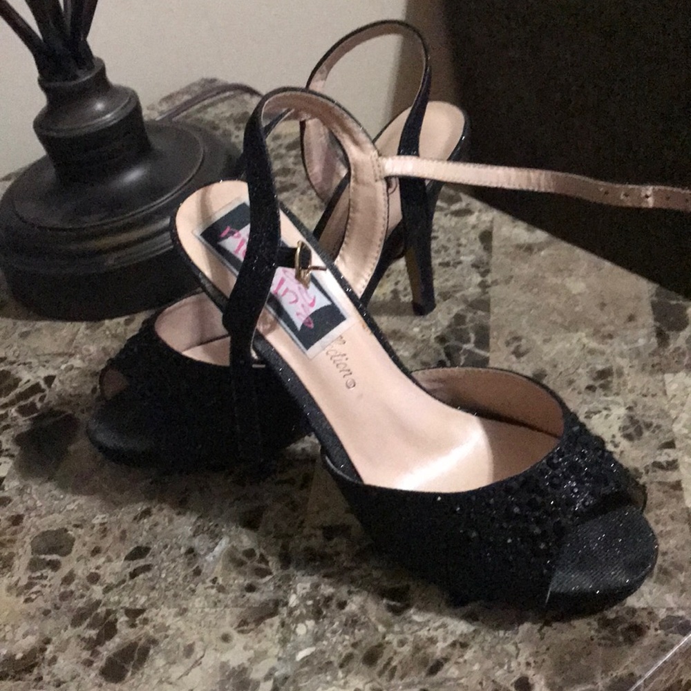 Black strapped heel